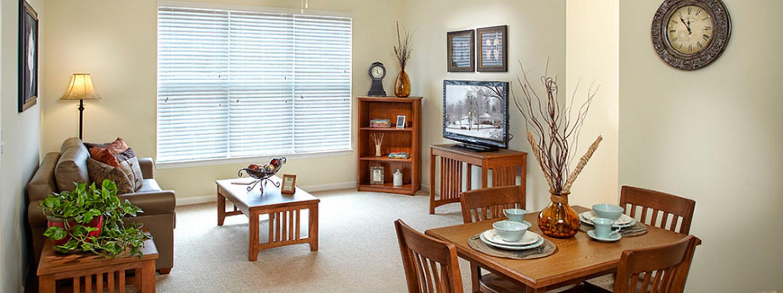 A photo of the living room and dining room at Pine View apartments on the campus of CIU.