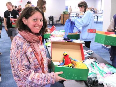 The Operation Christmas Child packing party. (Photo by Chariti Mealing) 