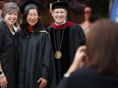 Gao Shan poses with CIU President Dr. Bill Jones and his wife Debby. (Photo by Noah Allard)